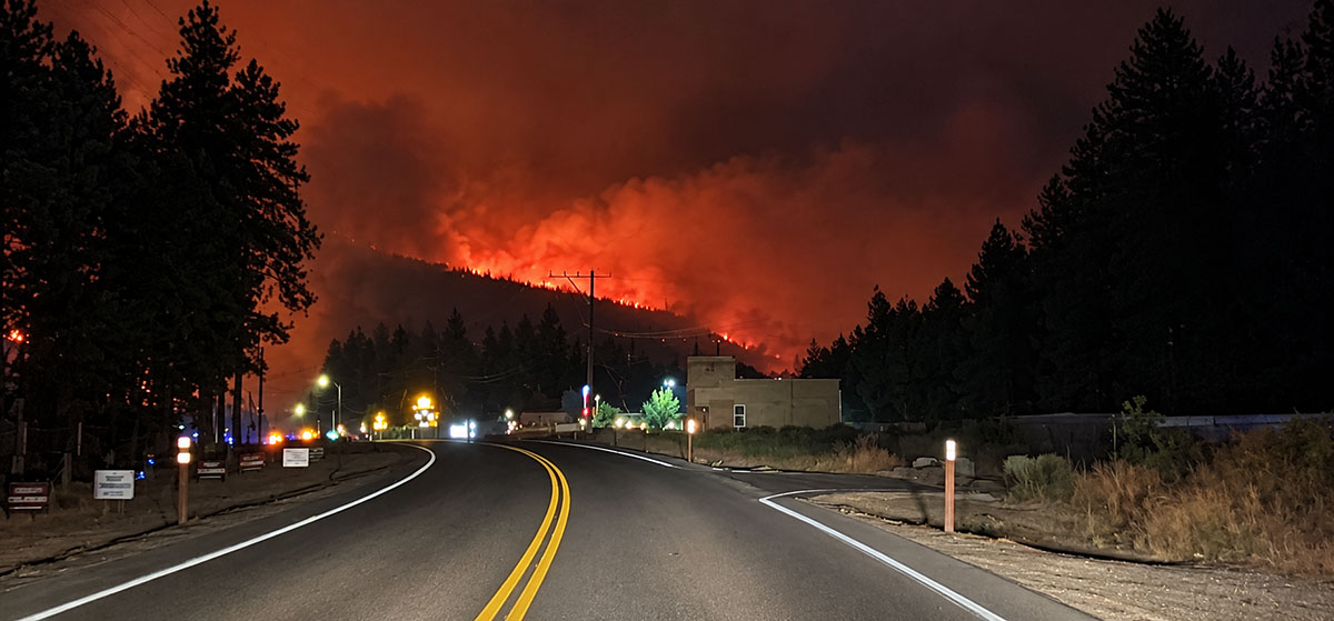 Autumn Lane wildfire glowing across the hillside at night
